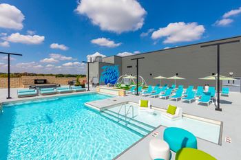 Resort-style heated pool with stunning water features